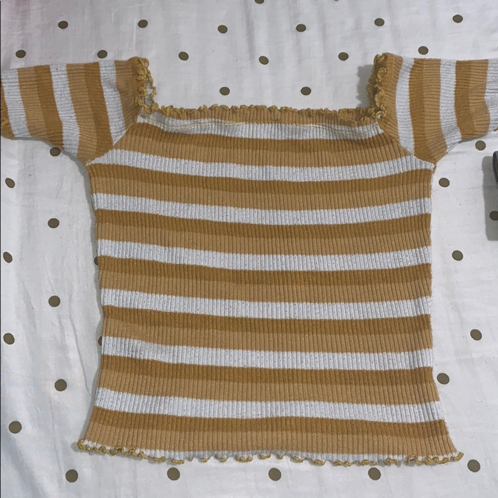 Yellow and white top. Off the shoulder